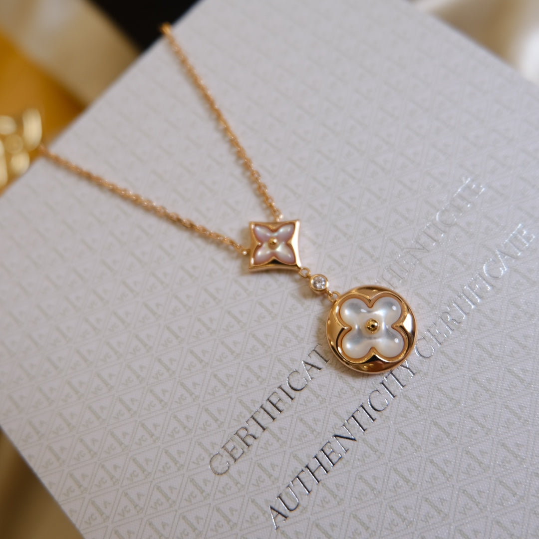 [GALE] Halskette mit Stern und Sonne, weißem Perlmuttmotiv, 2 Motive, rosa-golden 
